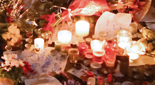 Close of candles and flowers at a Parisian gathering to honor the victims of the November 2015 terrorist attack in the French capital.